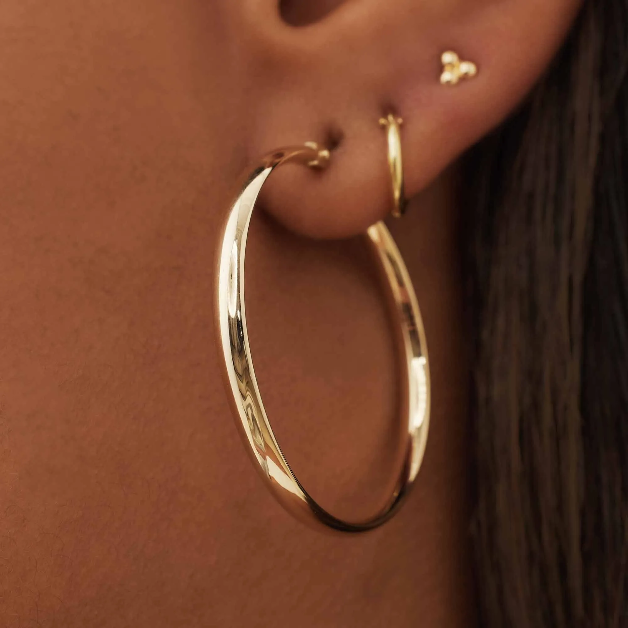 Rivoli Estrella 14 karat gold hoop earrings (30 mm)