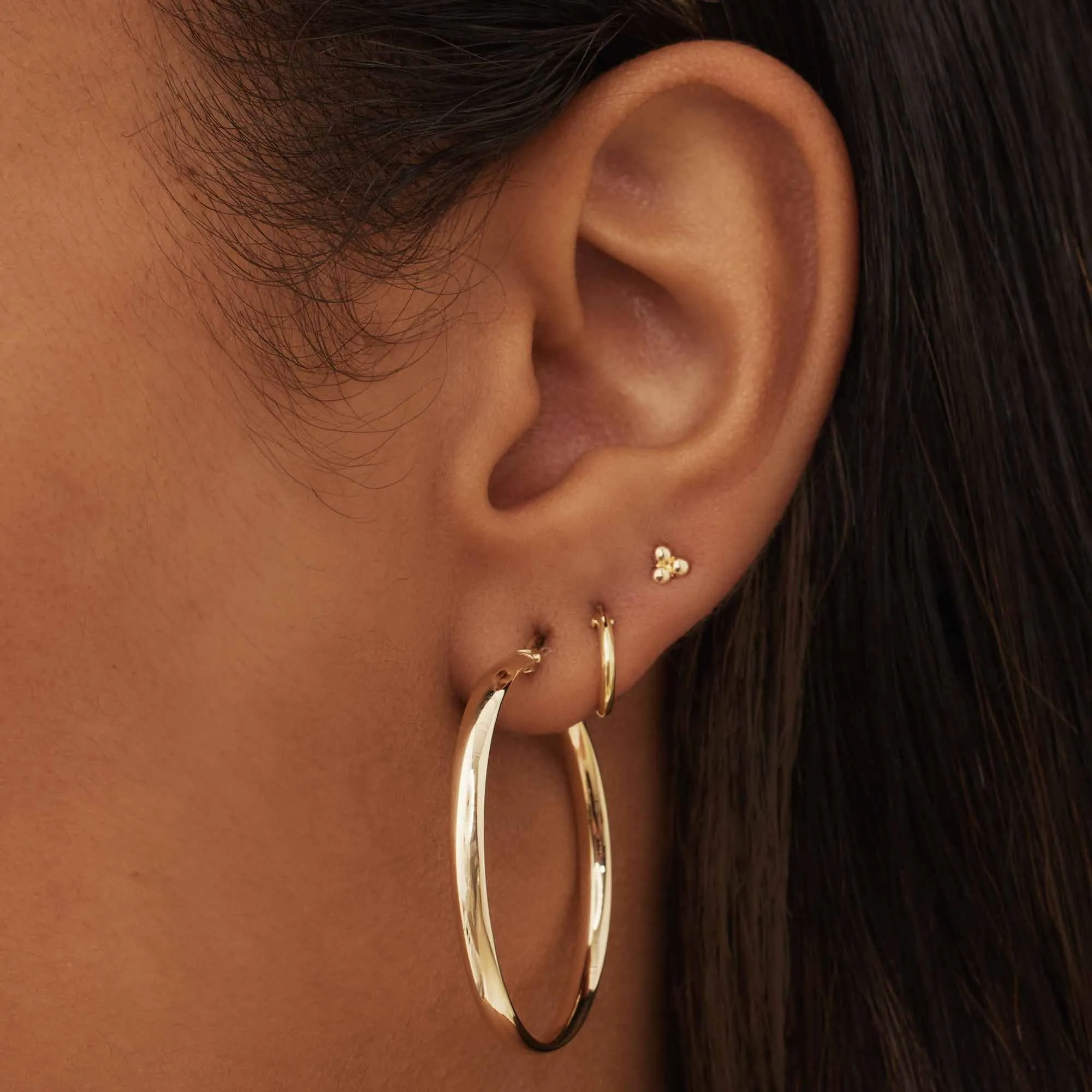 Rivoli Estrella 14 karat gold hoop earrings (30 mm)