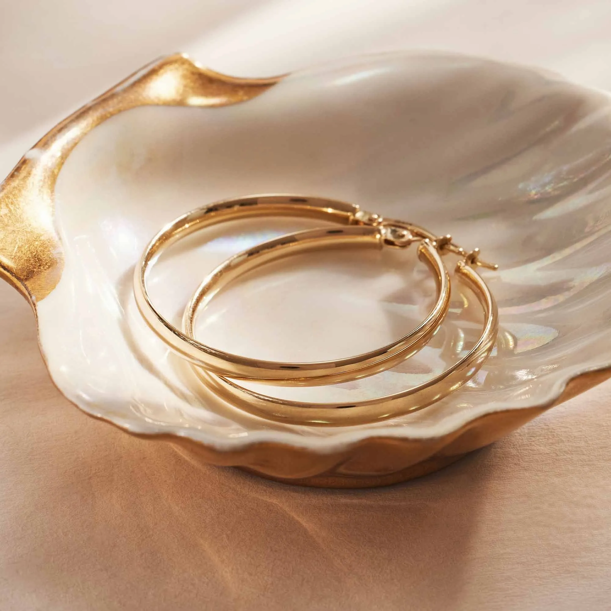 Rivoli Estrella 14 karat gold hoop earrings (30 mm)