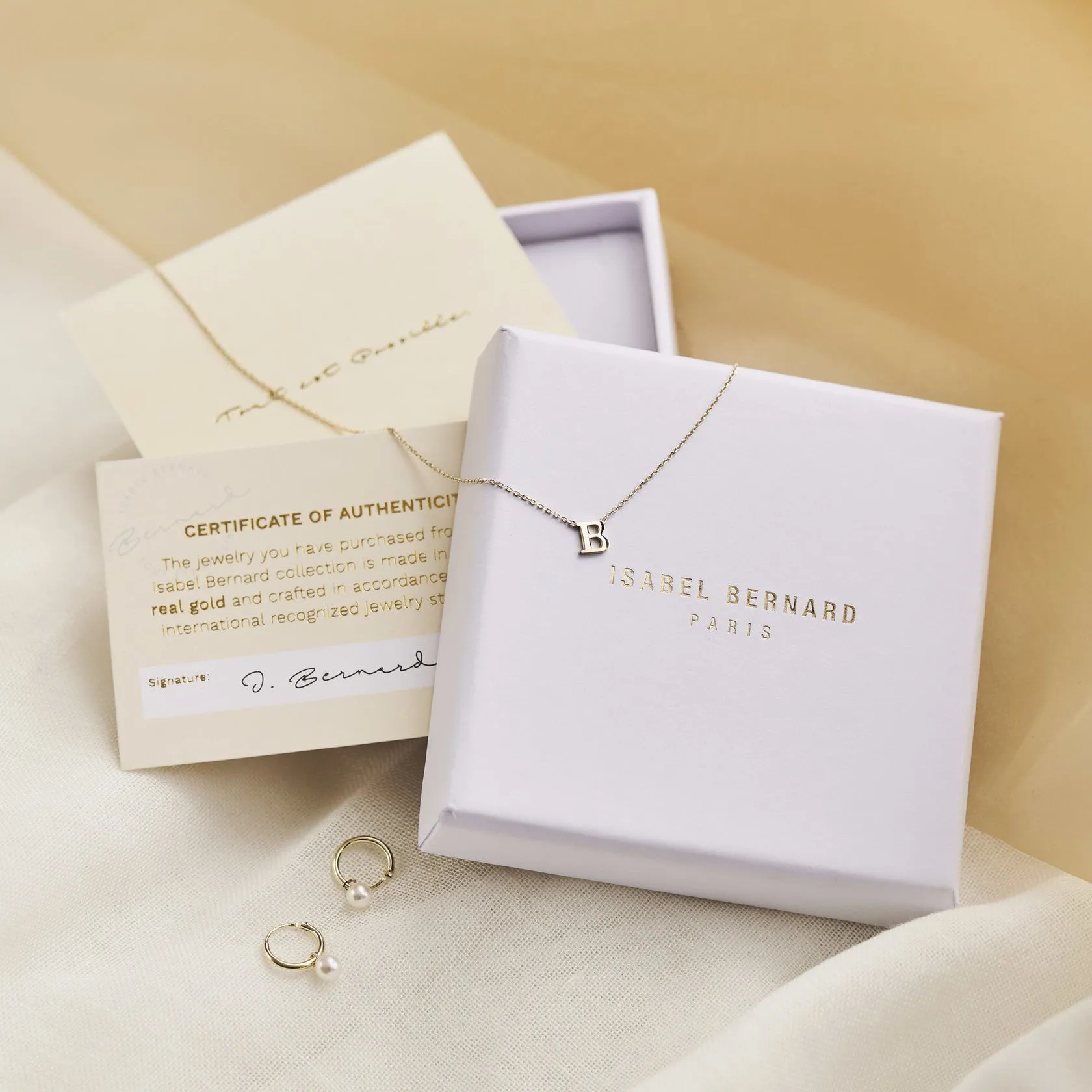 Odette Rivoli 14-Karat Twisted Gold Hoop Earrings